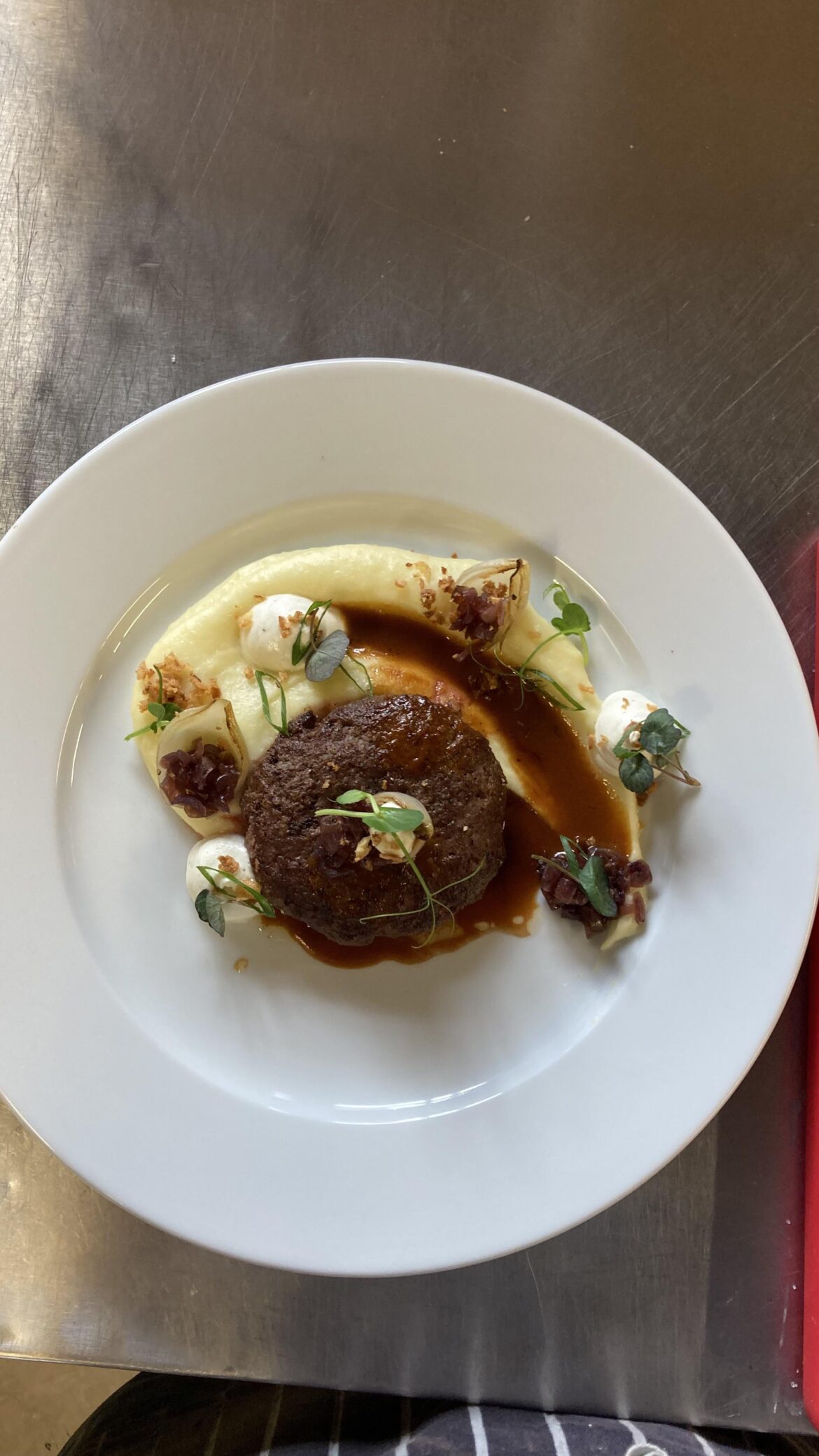 Wagyu steak haché, pomme purée, onions three ways, cream cheese.