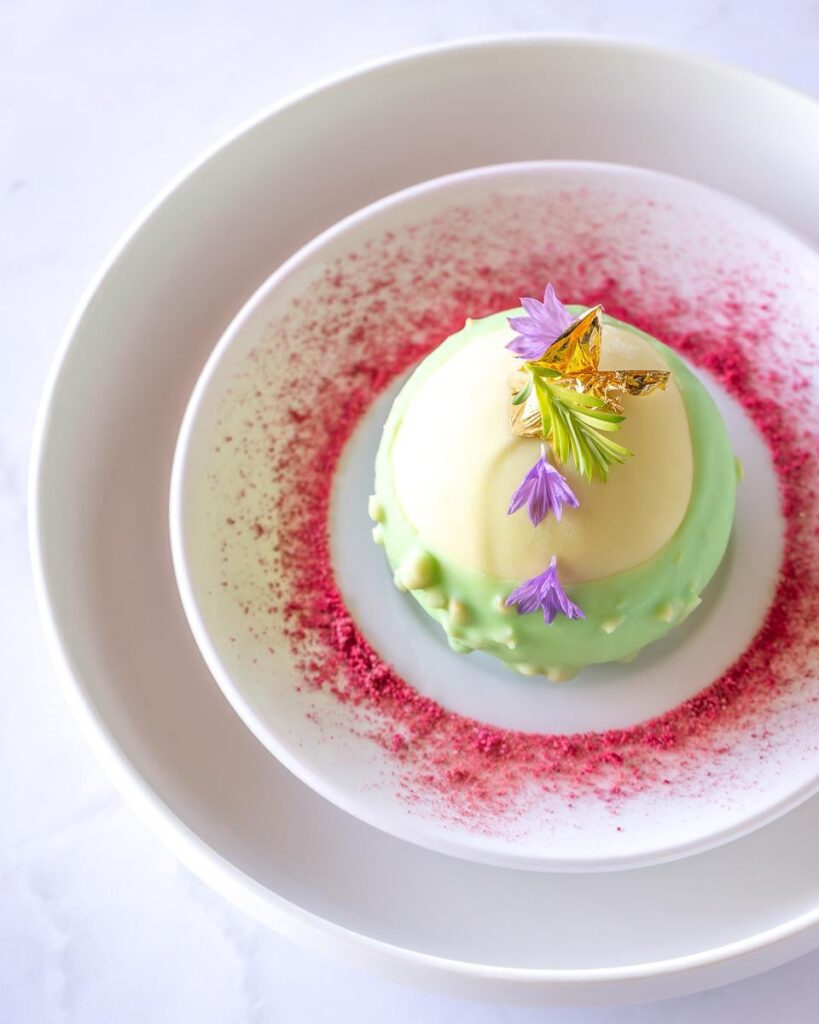 Redwood Tip Ice Cream with White Chocolate Pine Nut Shell and Dehydrated Raspberry Powder