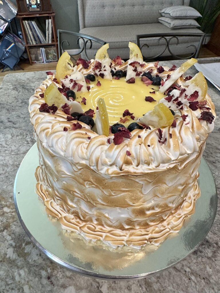 Lemon meringue cake for grandma’s birthday. Vanilla smbc and lemon curd filling with toasted meringue on the outside.