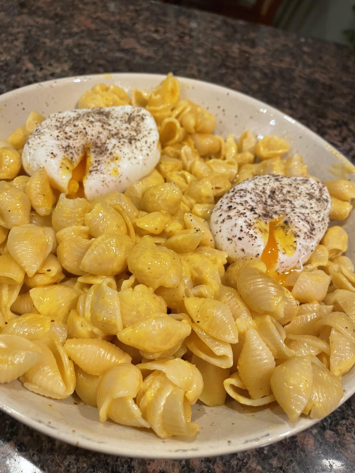 A late night drunken elevated with a poached egg Velveeta Mac & Cheese.