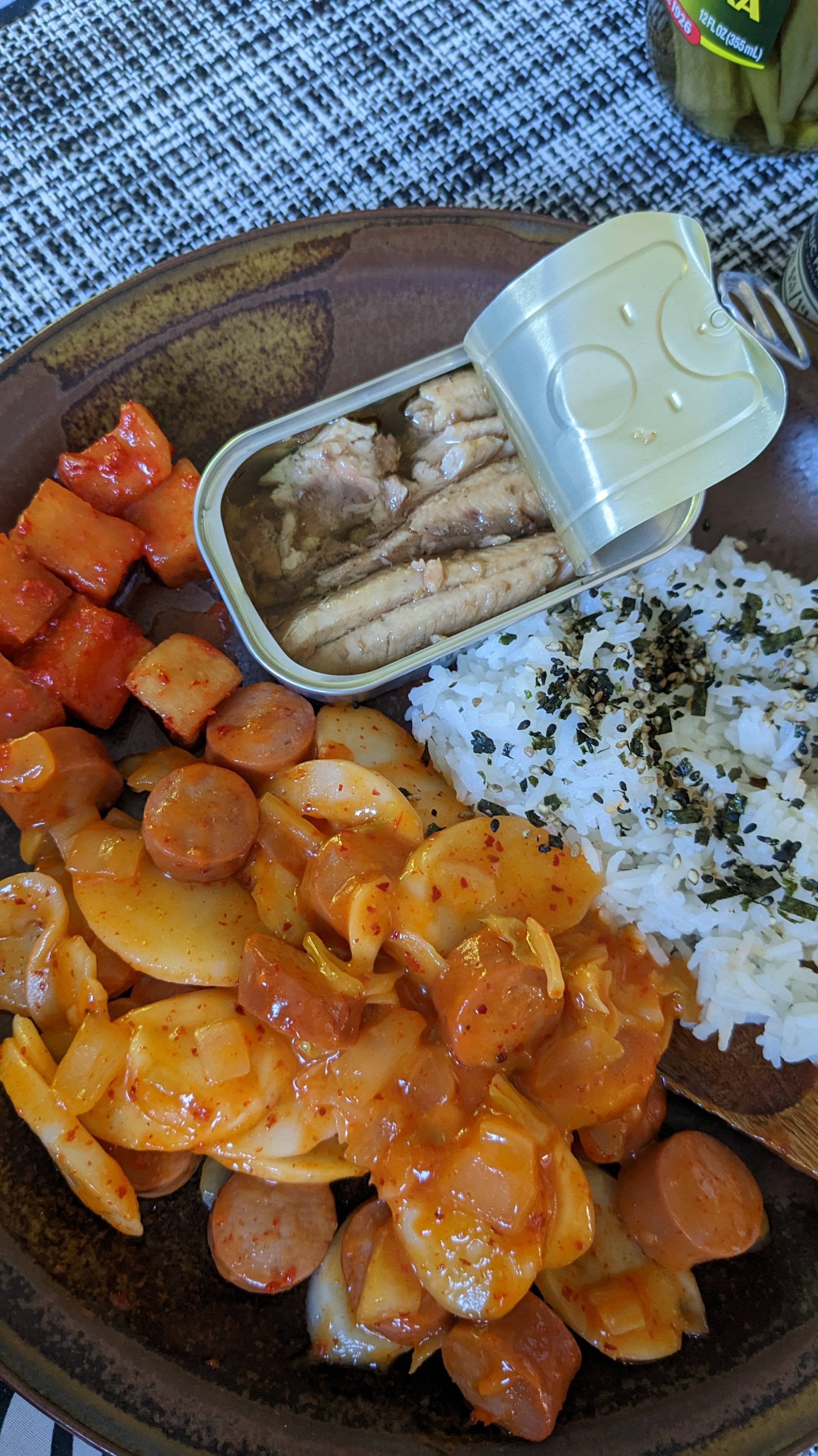 Season sardines in olive oil, radish kimchi, Korean rice cakes with