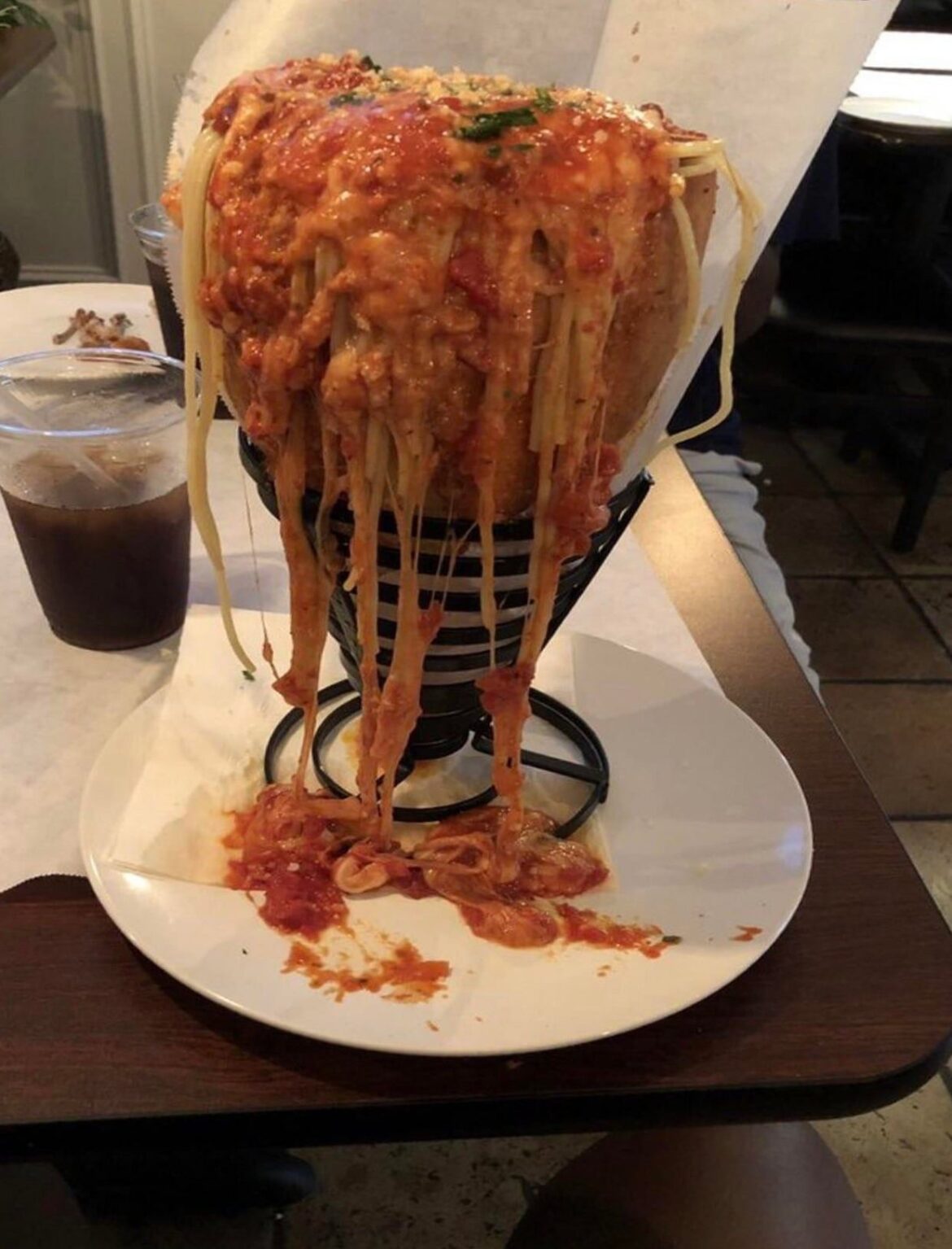 Spaghetti bolognese in a bread cone