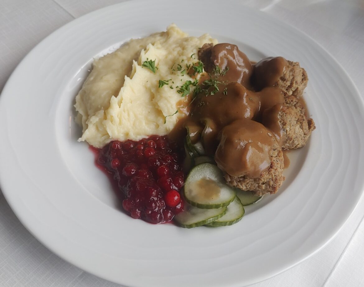 Finnish meatballs with mashed potatoes, cucumber and lingonberries
