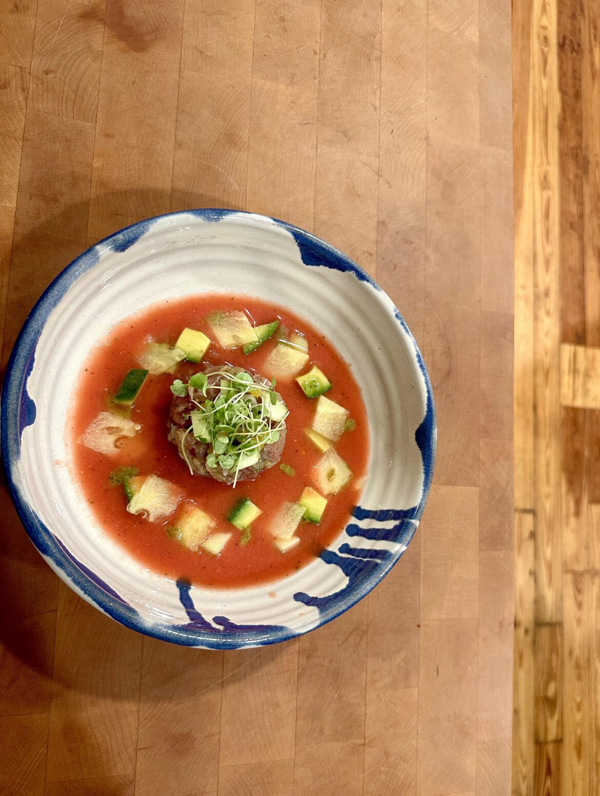 Tuna ceviche, fermented habanero/orange paste, pickled watermelon rind, watermelon gazpacho, yellow watermelon, avocado, herbs, shaved manzano peppers.