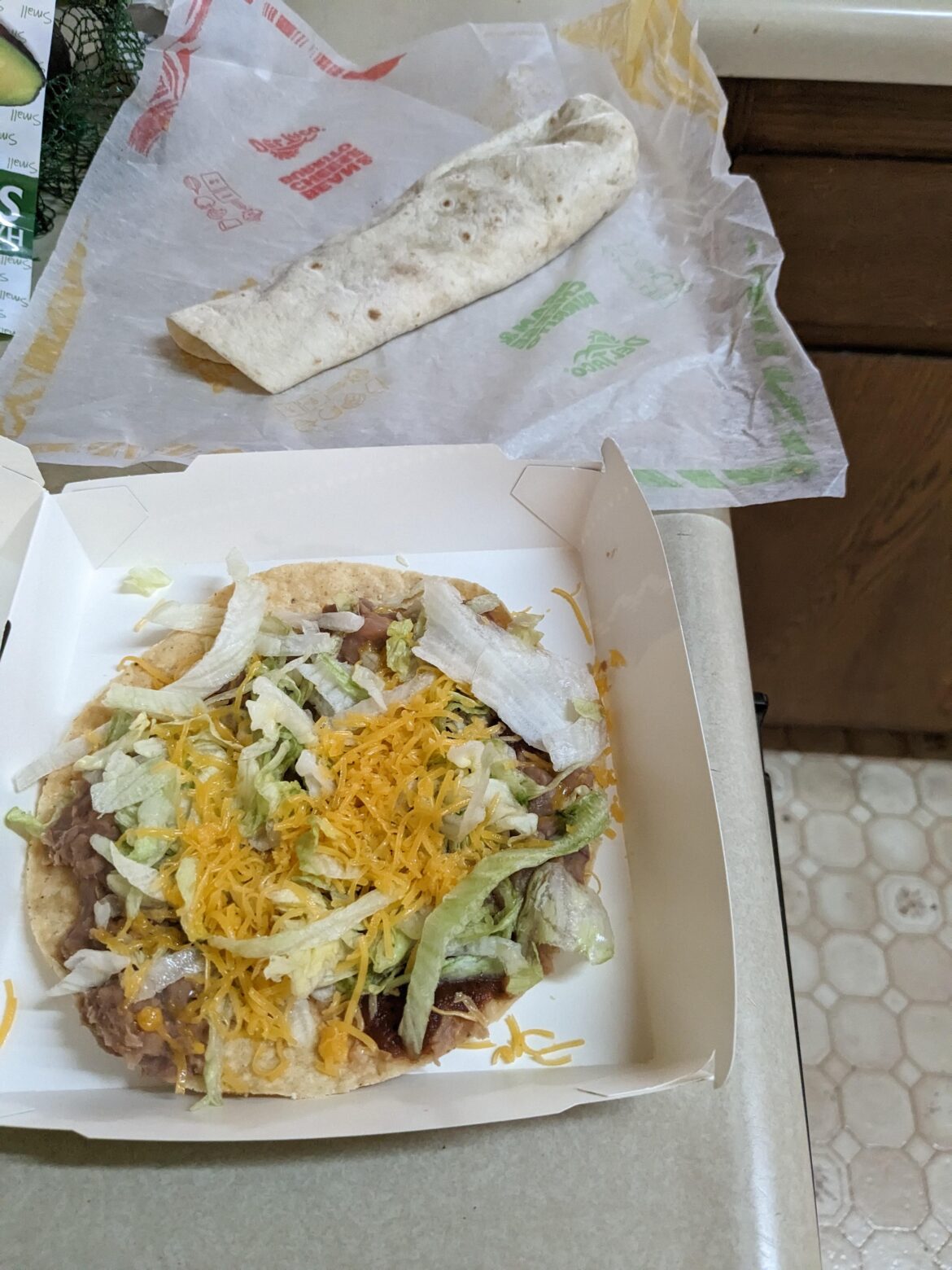 Del Taco tostada and bean and cheese burrito