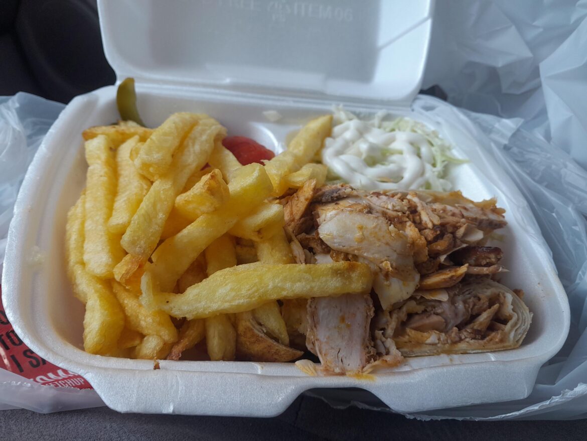 The king of Lebanese street food, the shawarma platter , the plate has a layer of garlic paste then the shawarma in pita bread then a layer of shawarma chicken, served with the best fries, rhe damage is $3.50 with a bebsi max.