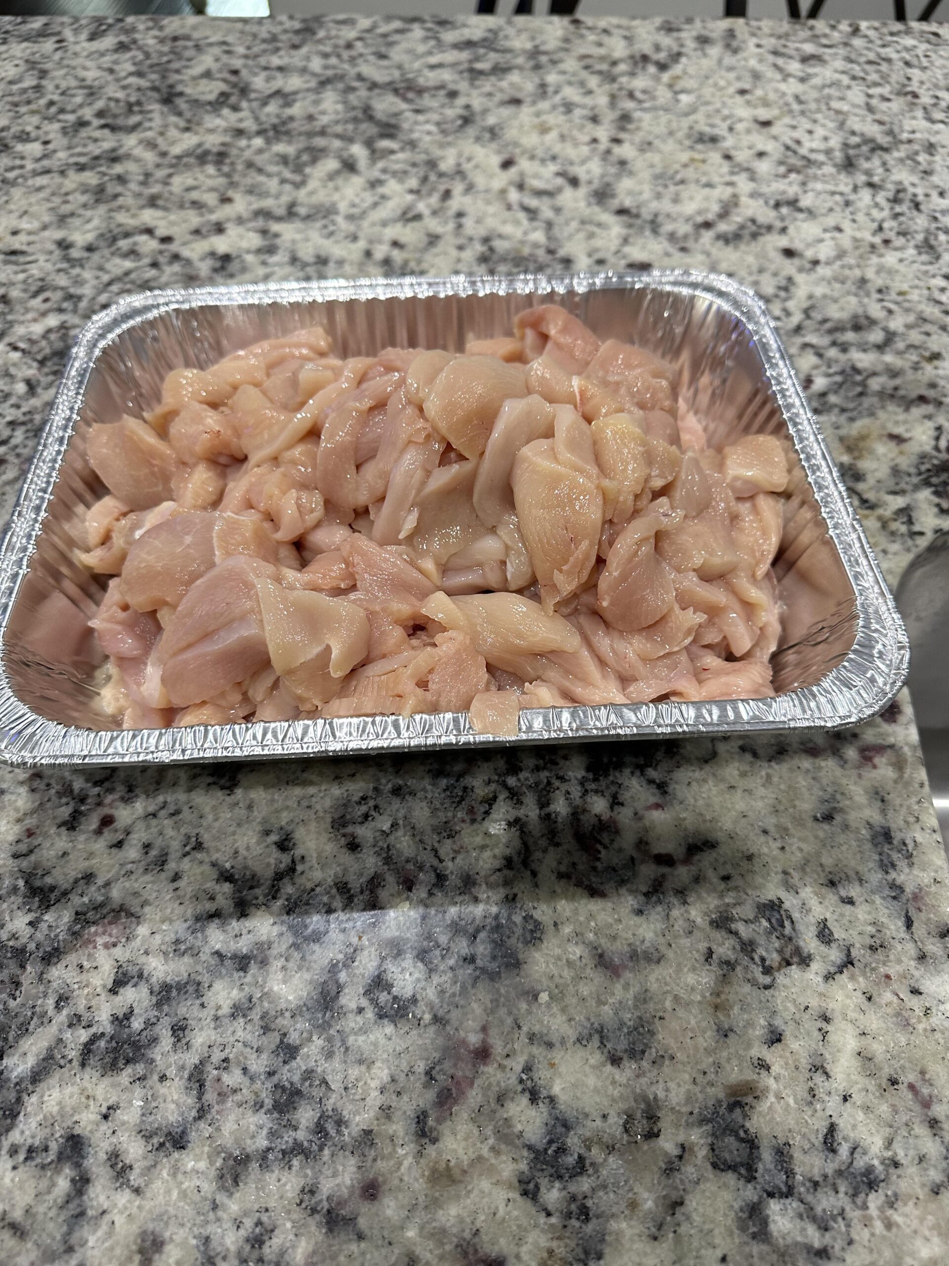 Smoking sliced chicken in a foil tray Dining and Cooking