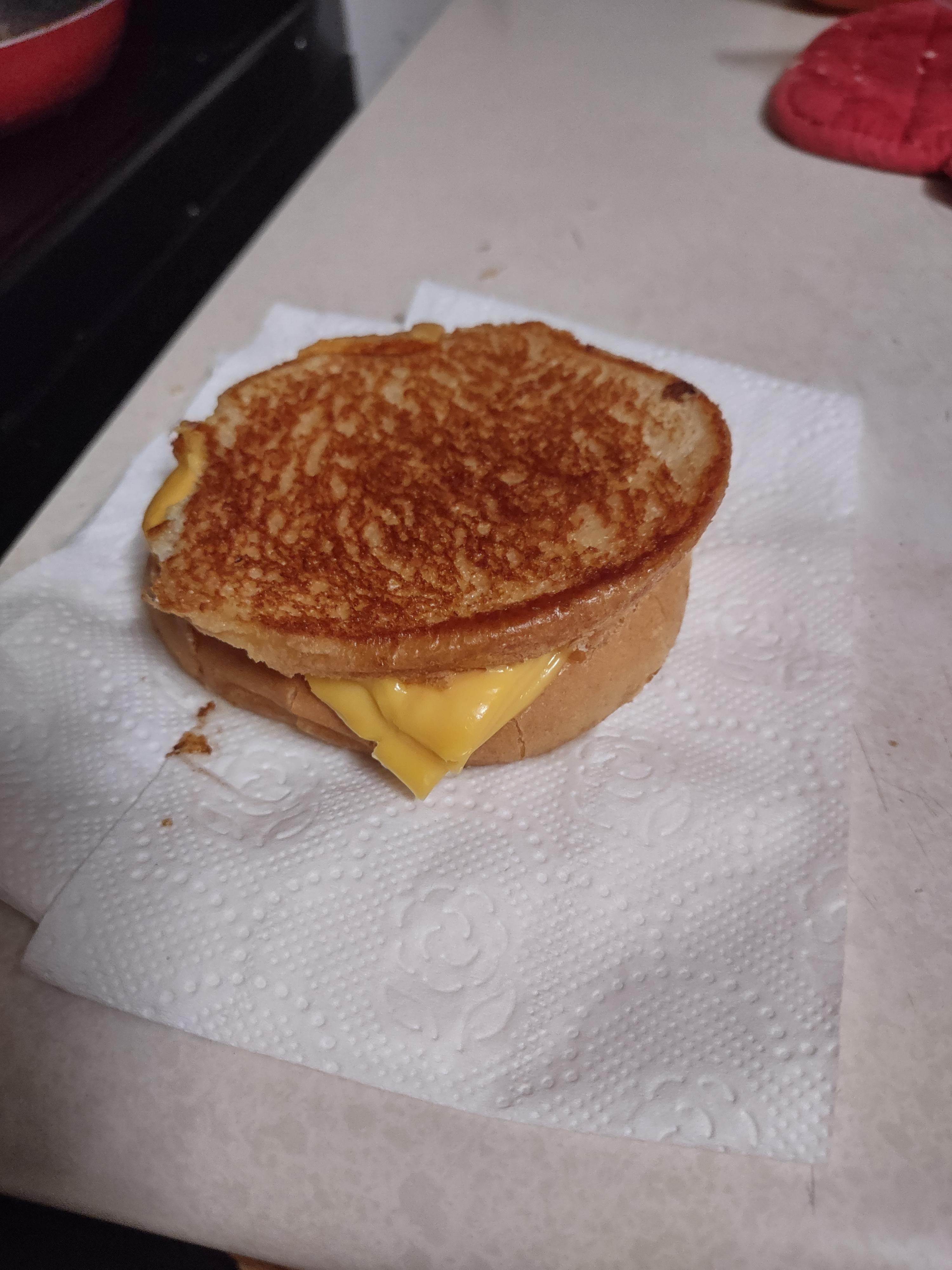 3am grilled cheese on hamburger buns served on a wad of toilet paper ...