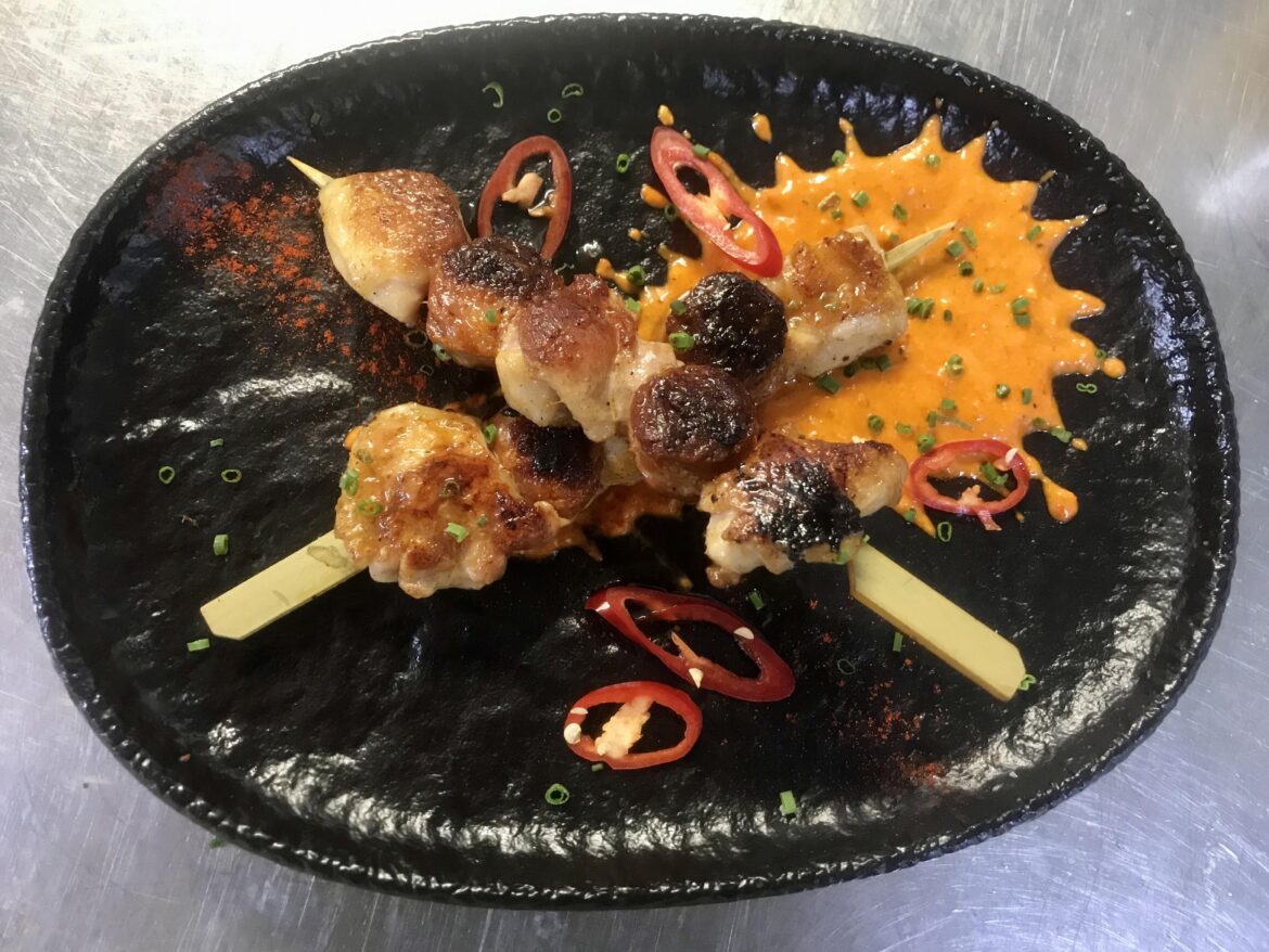 Chicken & chorizo skewers with romesco, sherry vinaigrette, chillies and chives