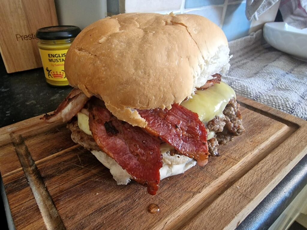 I made a bacon double cheeseburger. Made with thick bacon bacon, homemade patties, Monterey Jack and cheddar on a white bap.