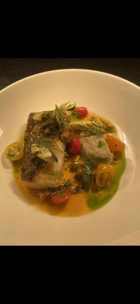 Hake, tomato, courgette, smoked Aubergine, harissa dressing