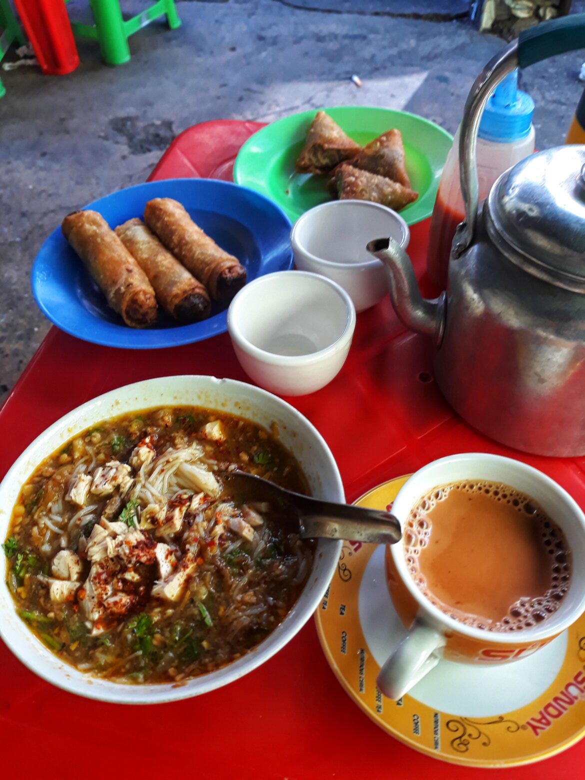 Noodle+tea at a bus stop - Myanmar