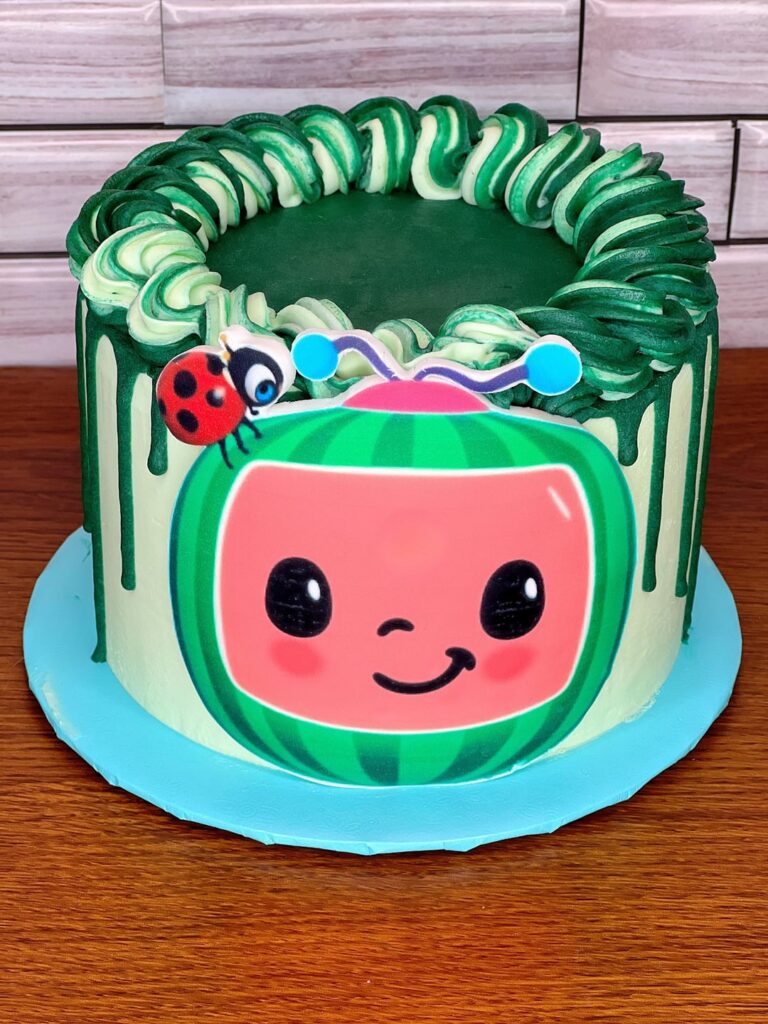 Coco melon smash cake