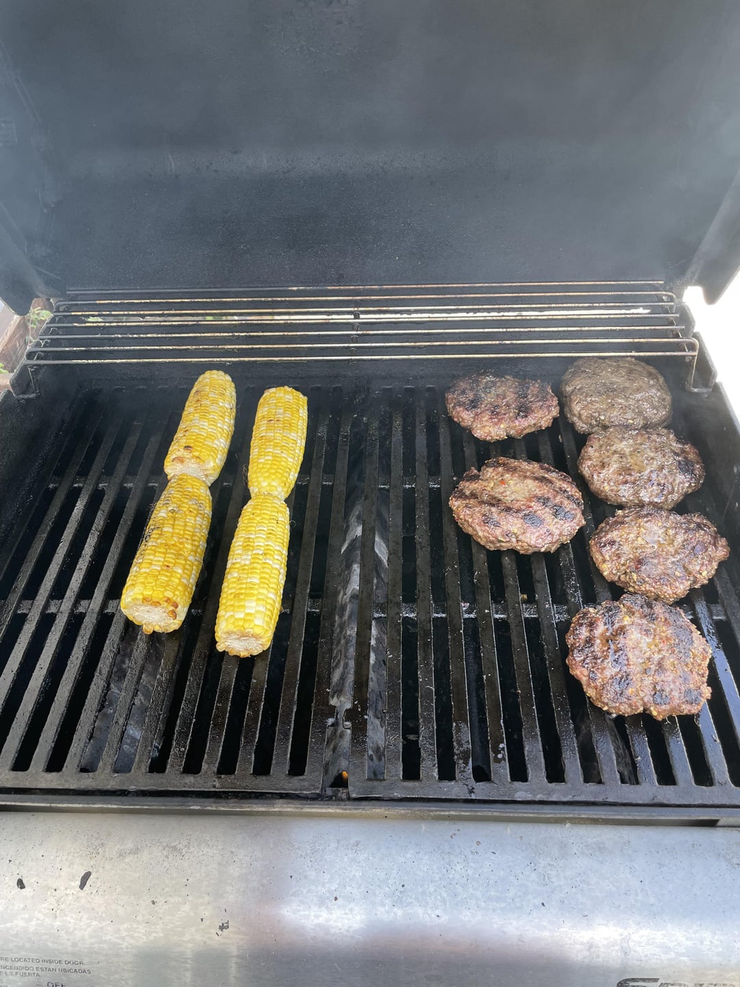 Got the bacon on the pellet smoker and burgers on the grill. Dining