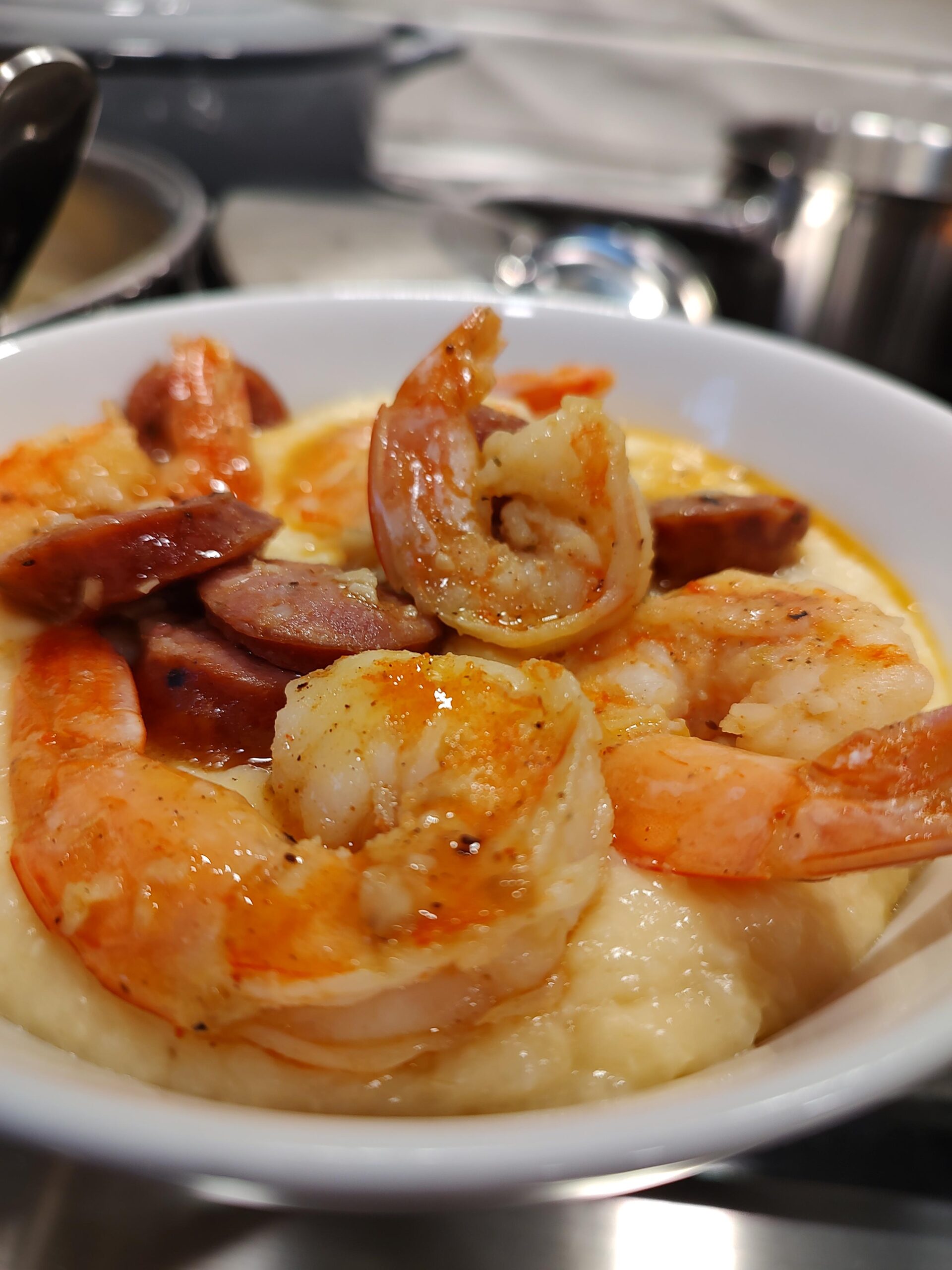 Shrimp and sausage over grits Dining and Cooking