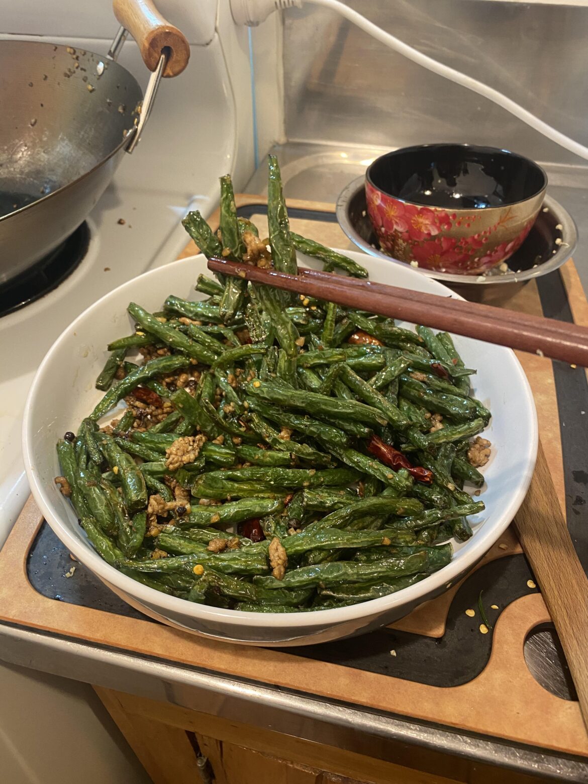 Gan Bian Si Ji Dou from ‘The Wok’ – shallow fried green beans with ground pork. Gan Bian Si Ji Dou from ‘The Wok’ - shallow fried green beans with ground pork.