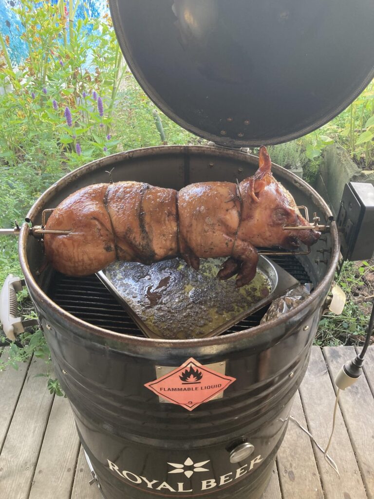 Grilling piglet in my UDS