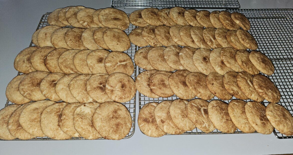 Stella's snickerdoodle cookies. I tripled the recipe. It says to have the oven at 400° for the first 6 minutes and then turn it down to 350°. Since I was doing so much I didn't want to do that so I just baked them at 375 and they came out great.
