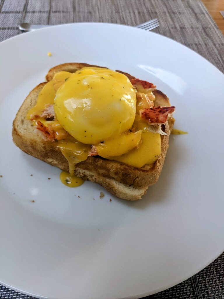 Lobster Eggs Benedict on grilled cheese