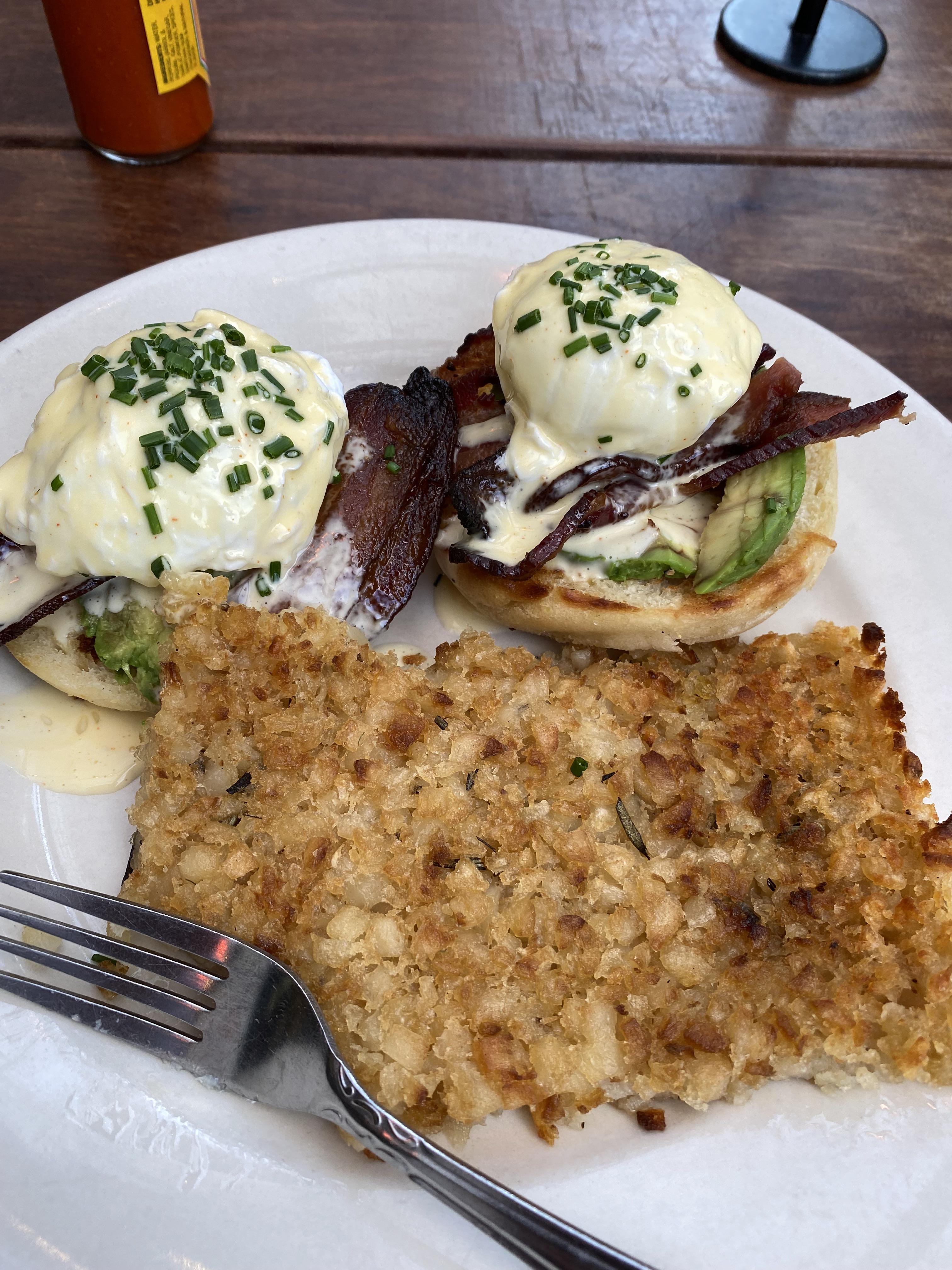Eggs Benedict and some hash browns with bacon. In SF Dining and Cooking