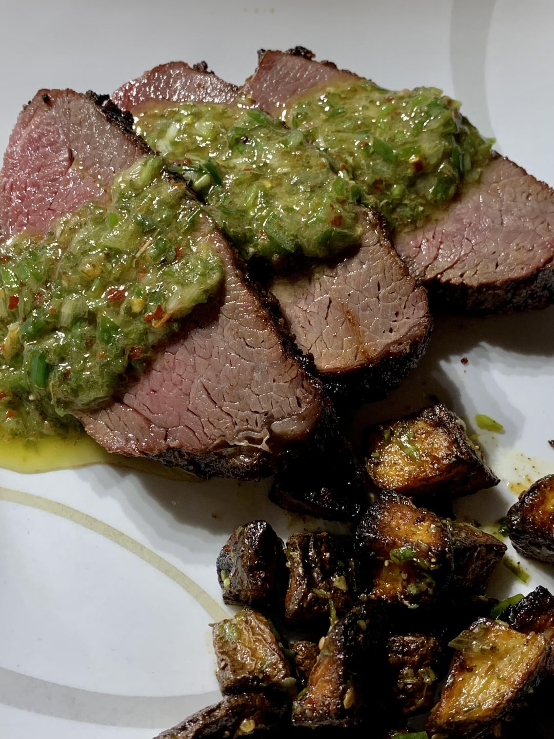 Grilled Tri Tip with a homemade Chimichurri sauce. First time making