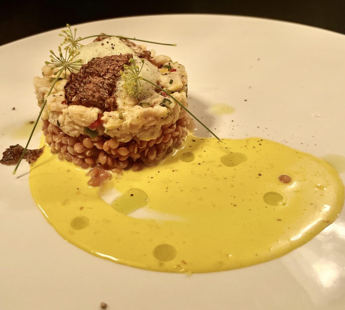 Yellowtail snapper ceviche, red lentils, saffron aioli, garden herb foam, snapper skin chicharrón, dill flower, ramp oil