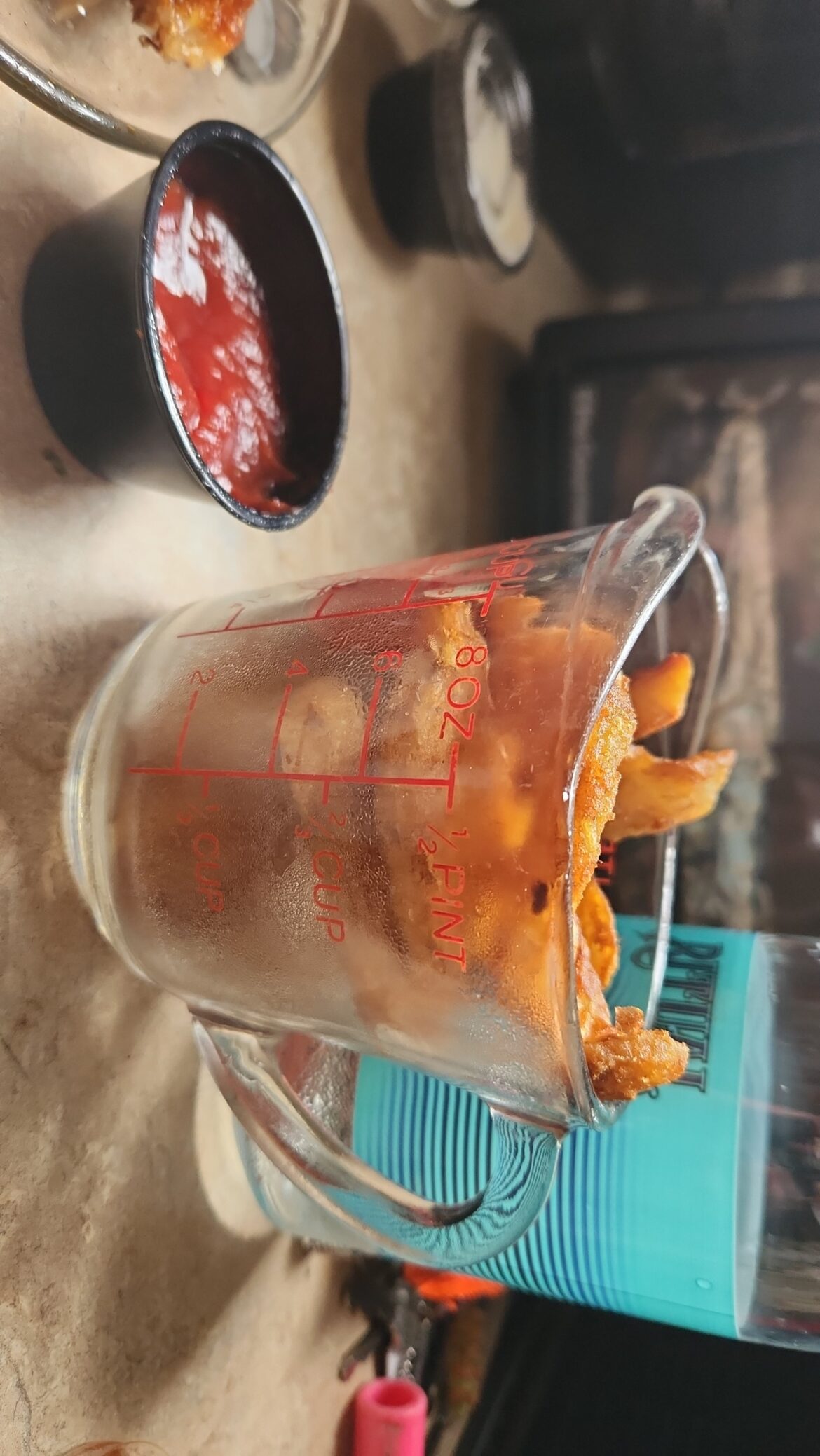 Fries in a Pyrex cup