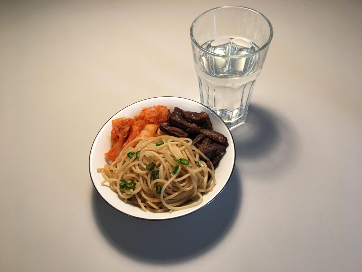 fried hearts and spaghetti with kimchi