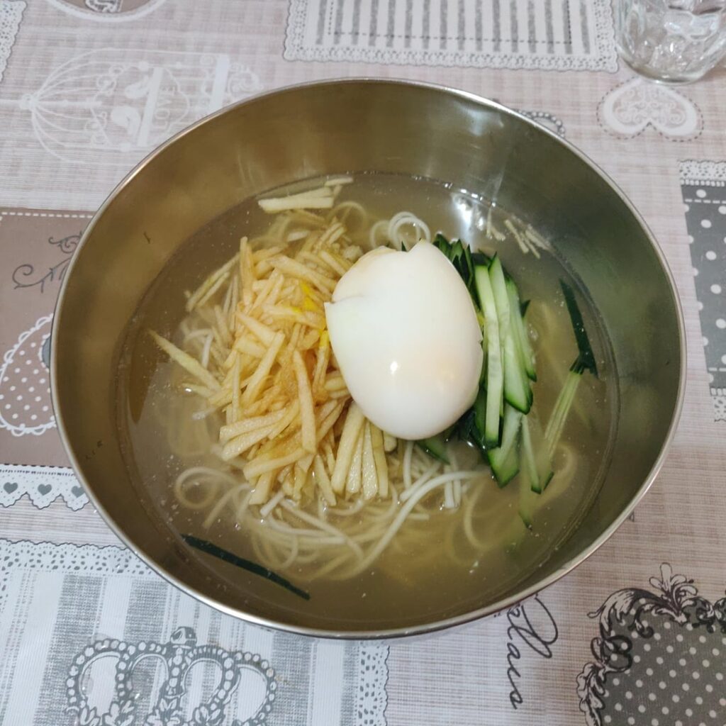 Mulguksu (?) If that's a thing, my broth turned yellow after cause it was a double yolker plus mustard