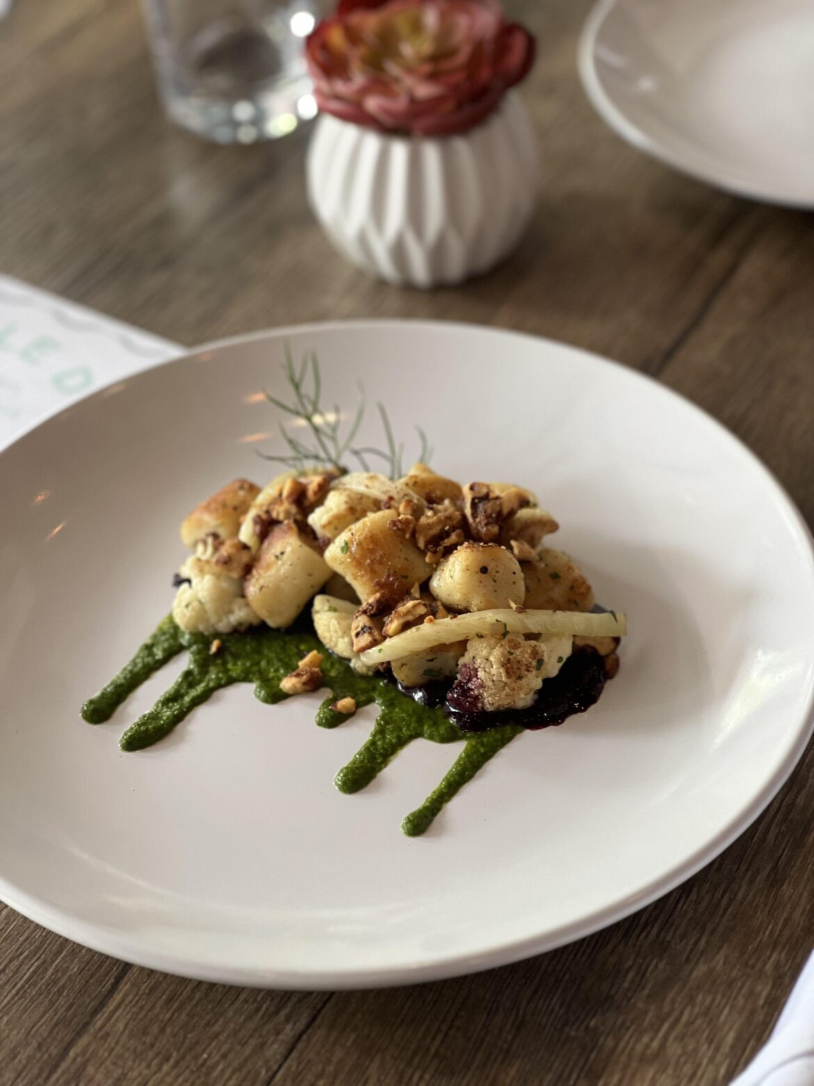 Lemon Ricotta Gnocchi•Fennel•Cauliflower•Spiced Walnuts•Mint Kale Pistou•Savory Blueberry Compote