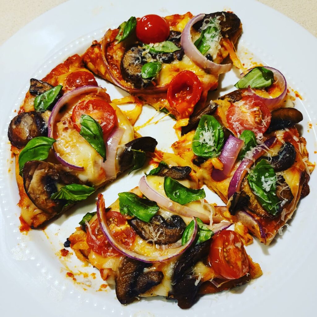 Homemade mini veggie pizza.