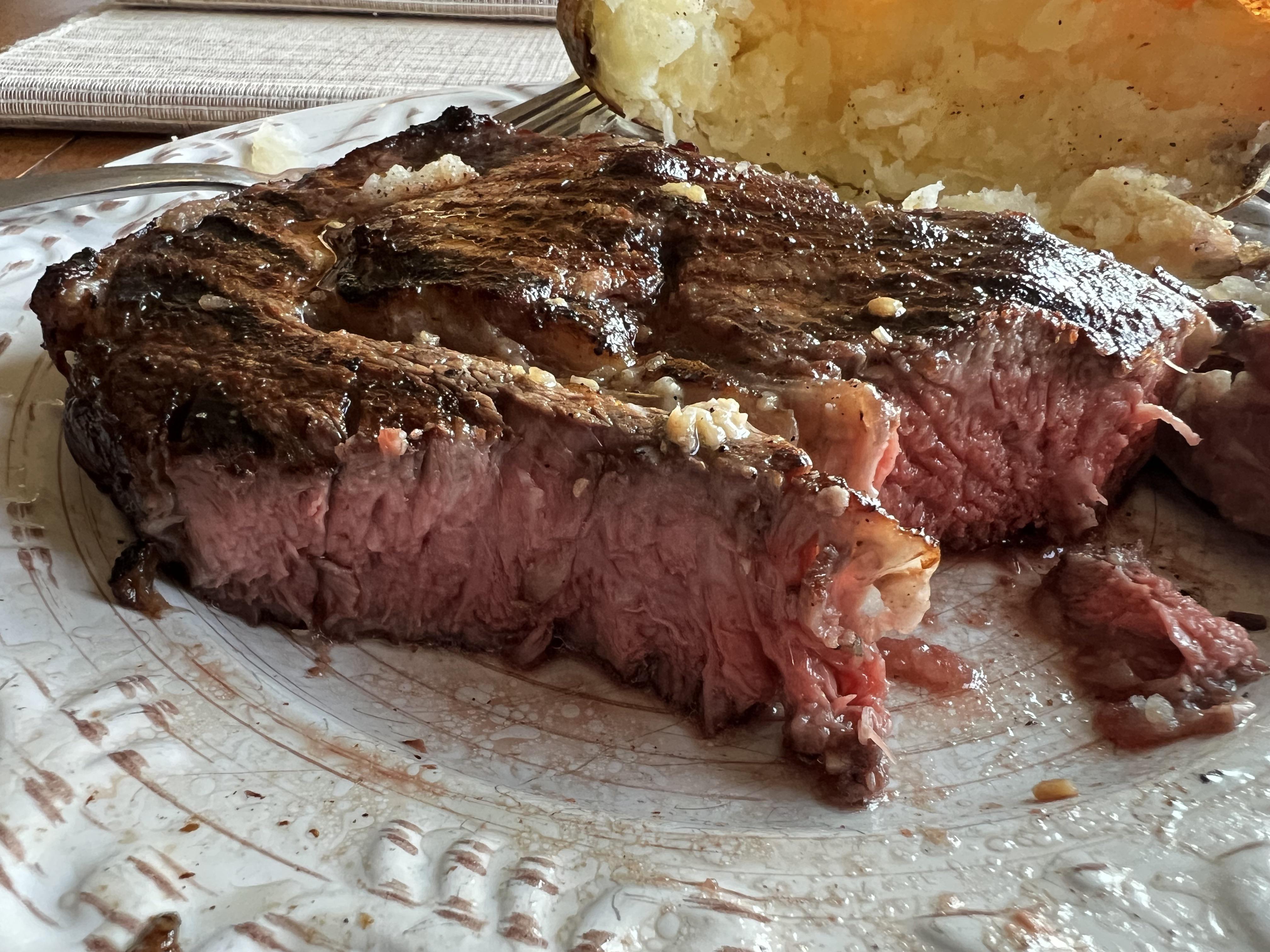 Sous vide Rib Eye and finished on the grill with garlic compound butter