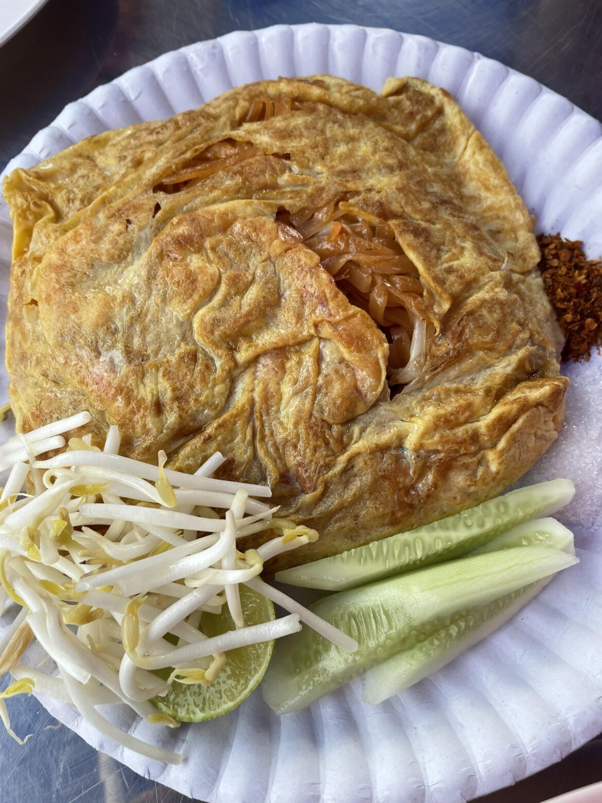 Egg wrapped pad Thai in Bangkok. Super popular way to serve pad Thai in Bangkok specifically!