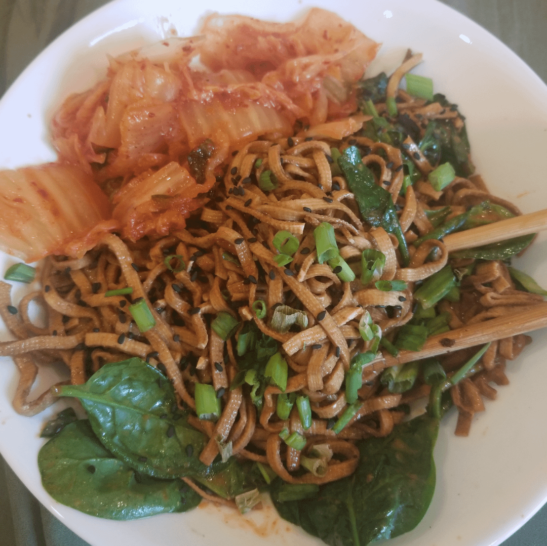 spicy bean curd strips stir fried in peanut butter gochujang sauce with