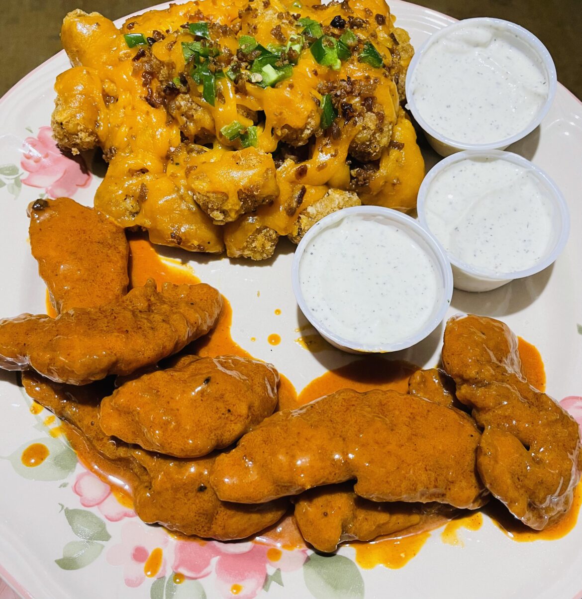 Buffalo chicken tenders & loaded tater tots w ranch.