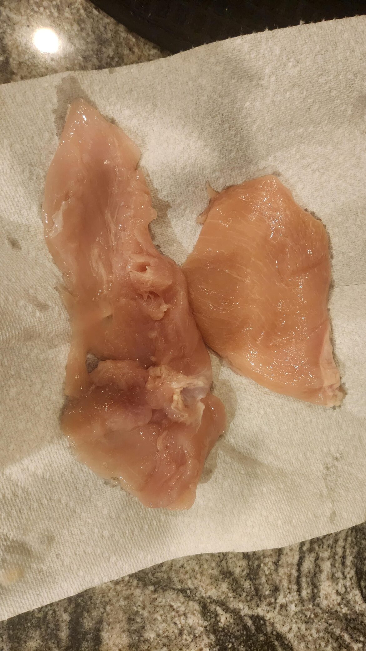 One chicken breast and one mangled carcass