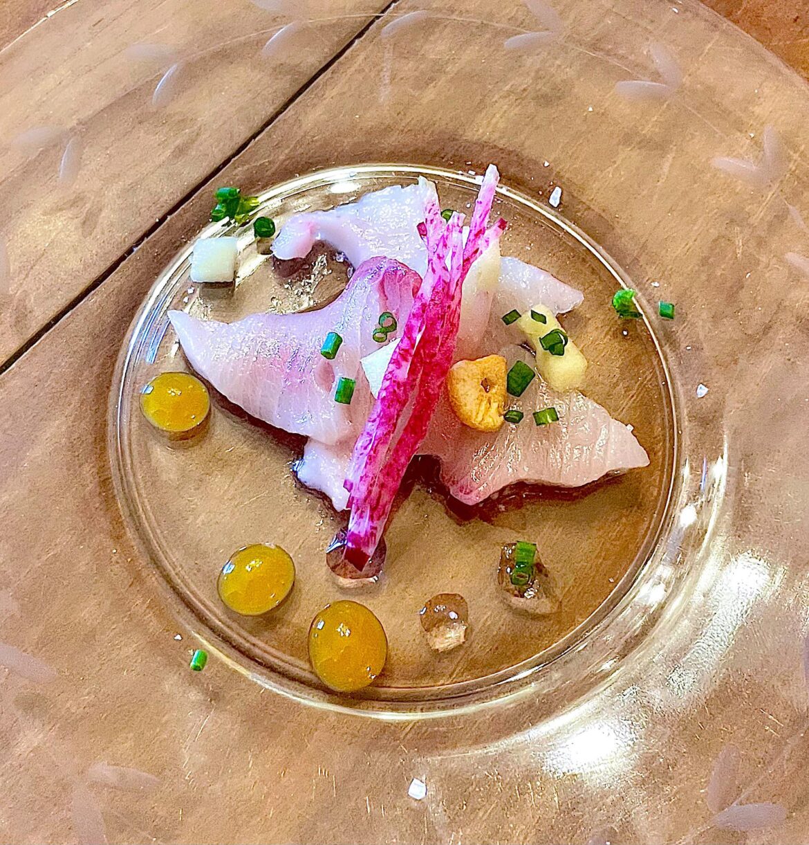 Hamachi crudo, jalapeño syrup, watermelon radish, garlic, brunoise Granny Smith, passionfruit gel, chive