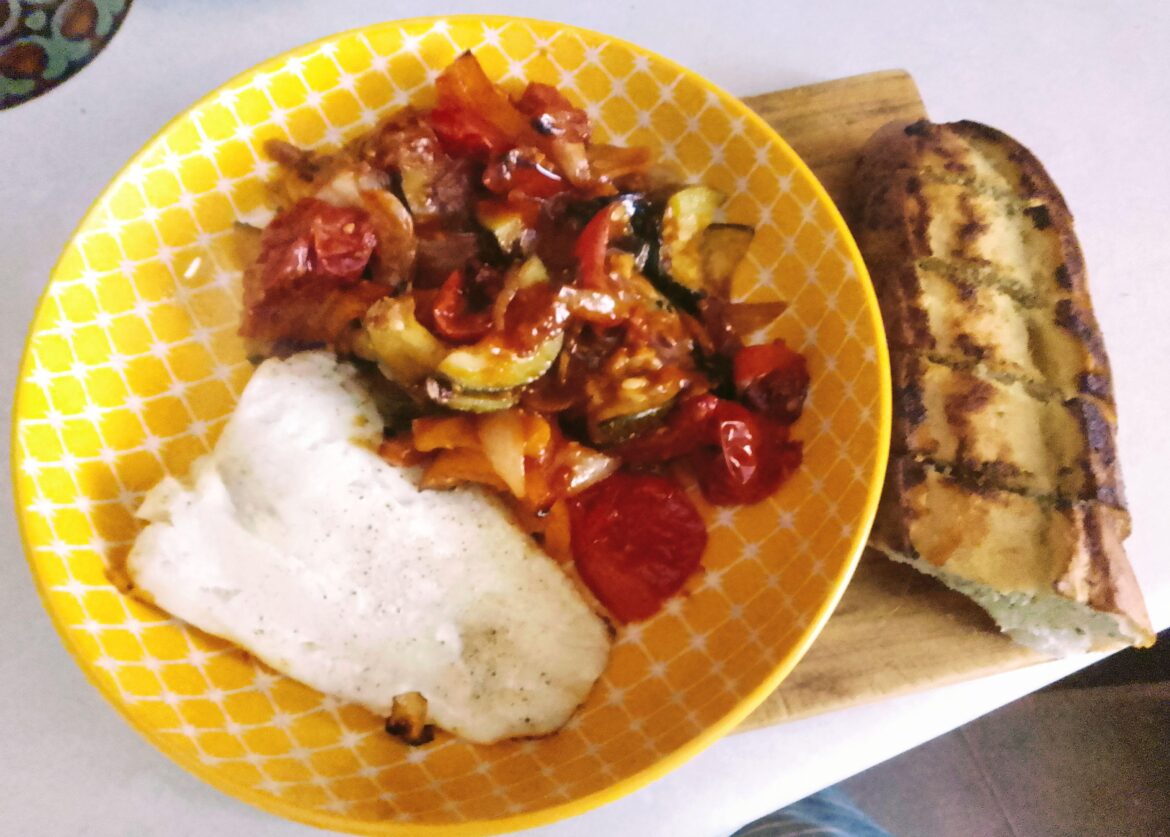 Baked cod with roasted Mediterranean vegetables.