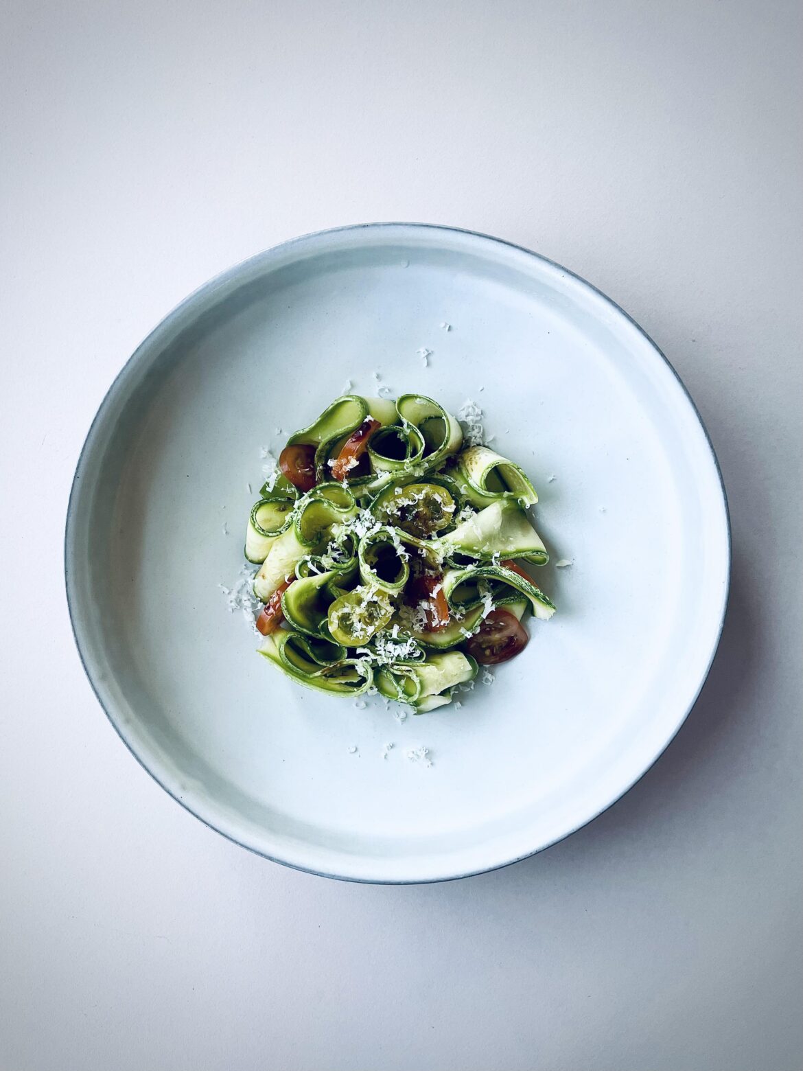 Zucchini salad lightly dressed with an olive oil + aged balsamic + anchovy vinaigrette and shaved parmigiano reggiano