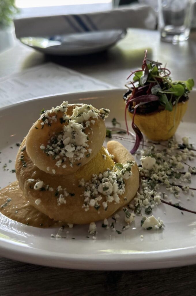 Eggplant & Zucchini Stuffed Yellow Squash, Fried Corn Spiral Dumpling, Heirloom Tomato Bisque, Herb Feta, Micros, Balsamic Reduction