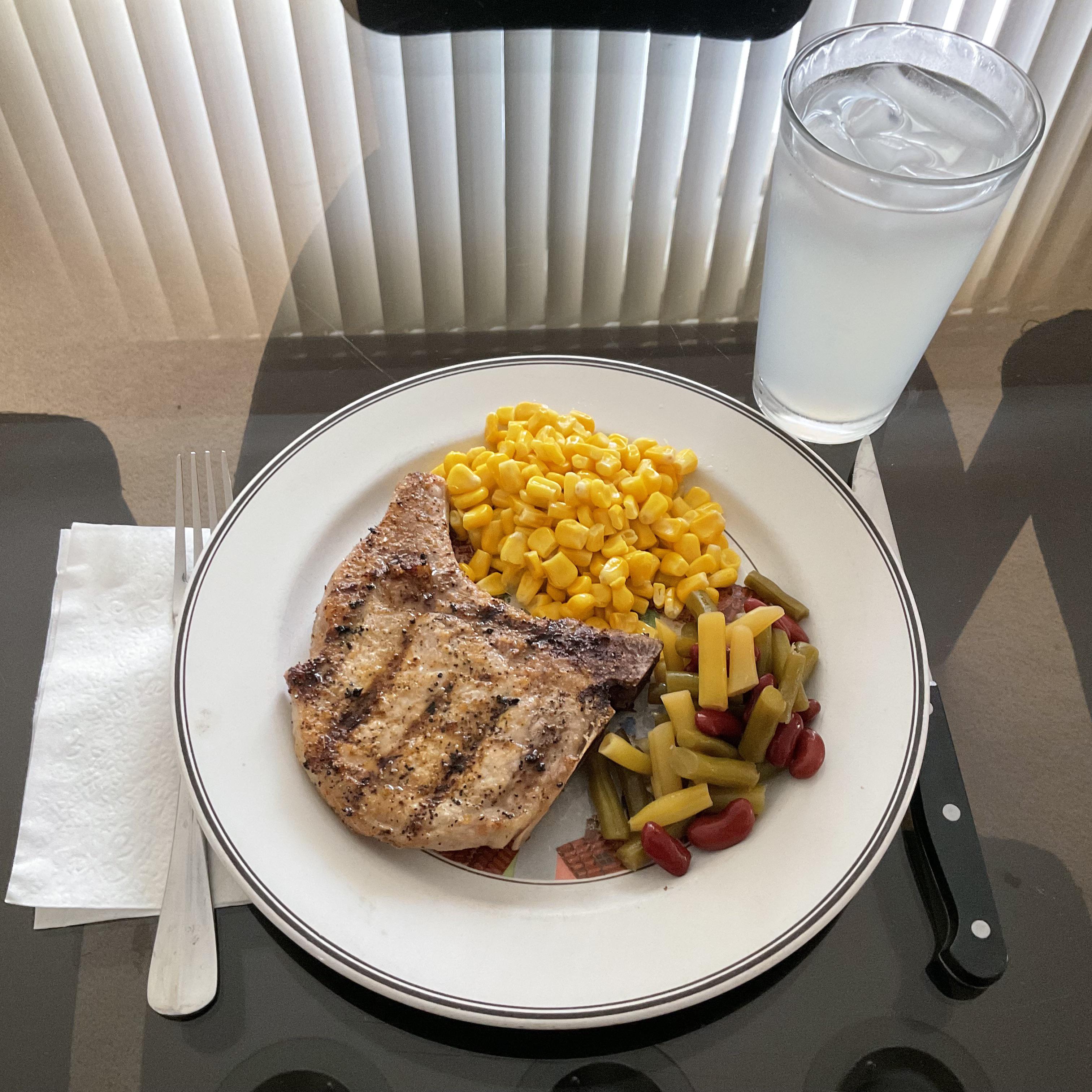 Grilled Pork Chop with Corn Niblets and 3Bean Salad Dining and Cooking
