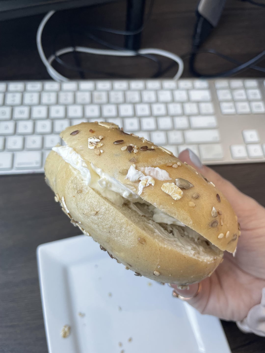 Calorie estimates for this bagel and cream cheese? (Hand for size