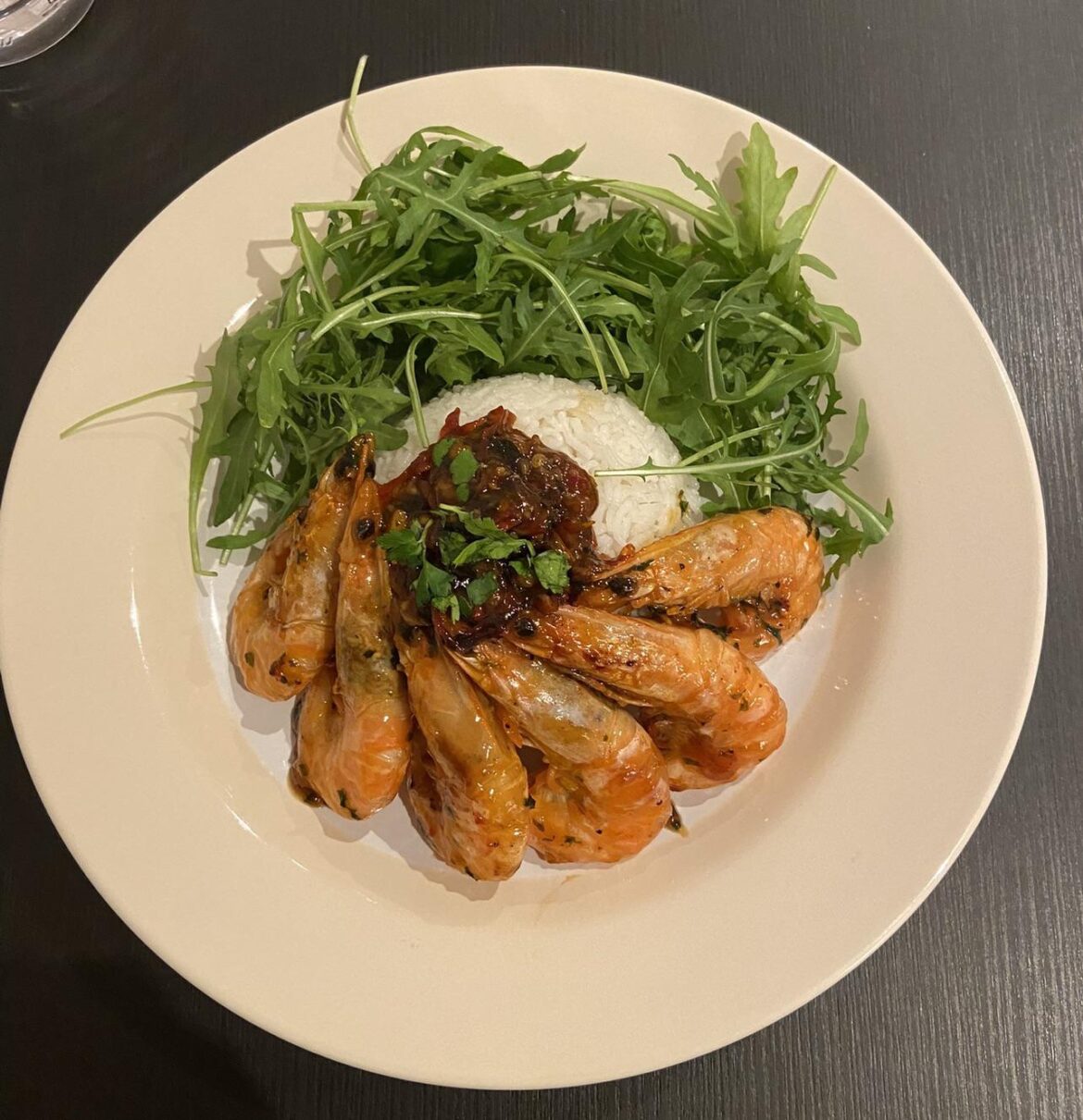 Sweet chilli and garlic prawns, coconut rice and rocket