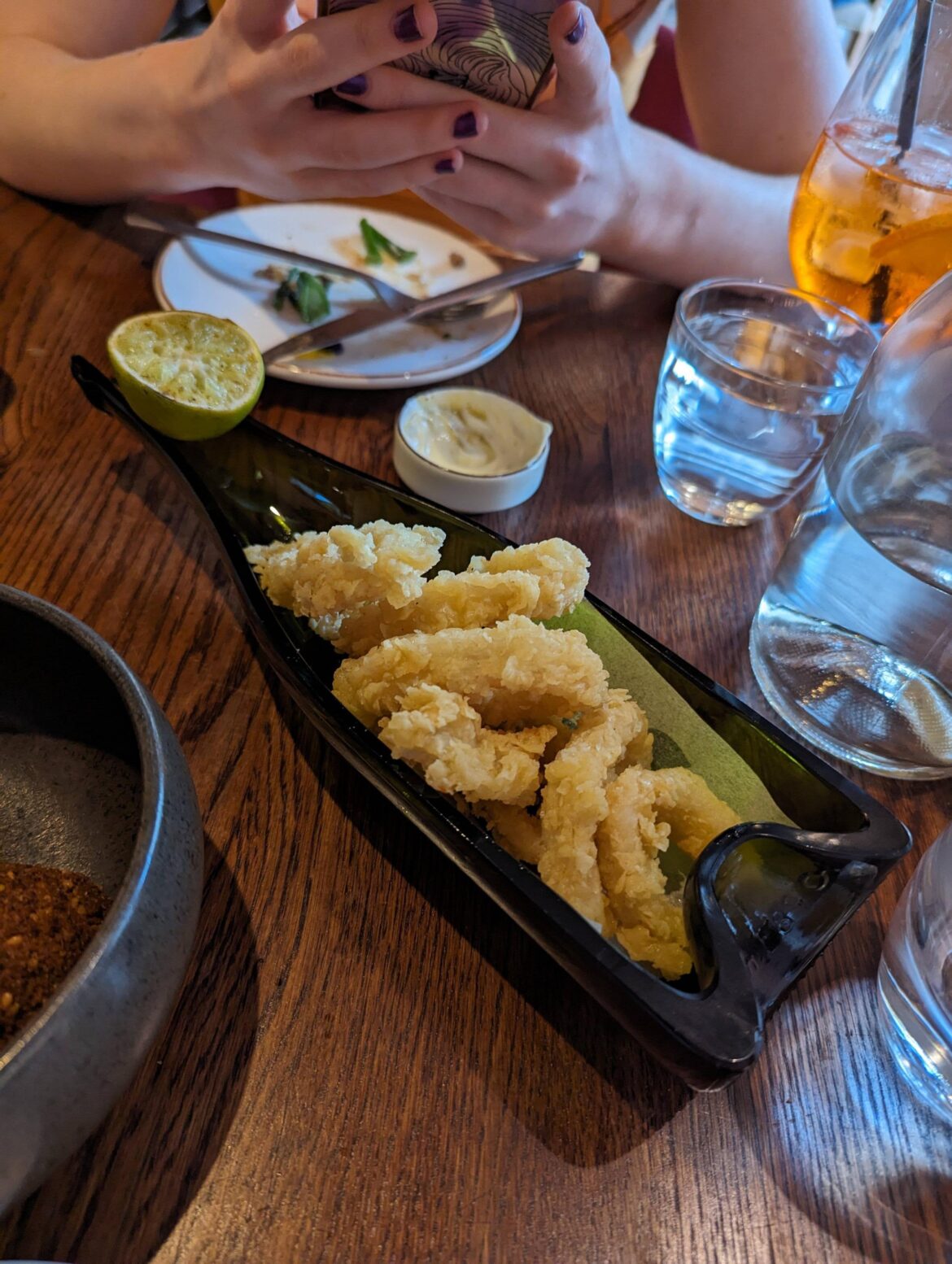 Calamari in half a wine bottle