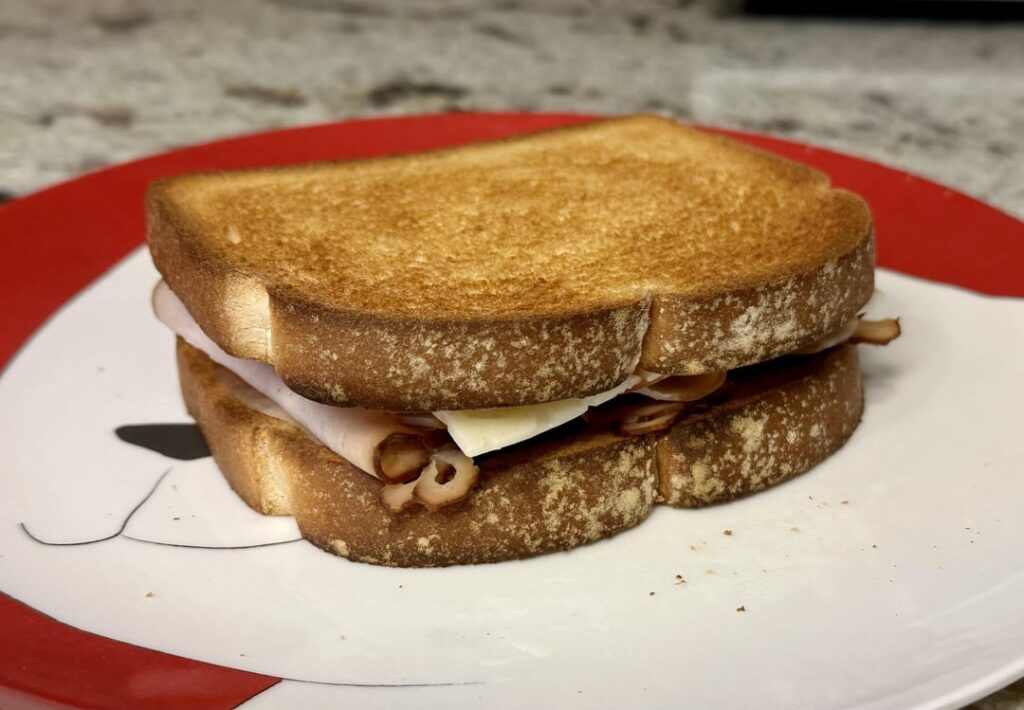 My childhood favorite: cold turkey and baby swiss on toast with just a little mayo