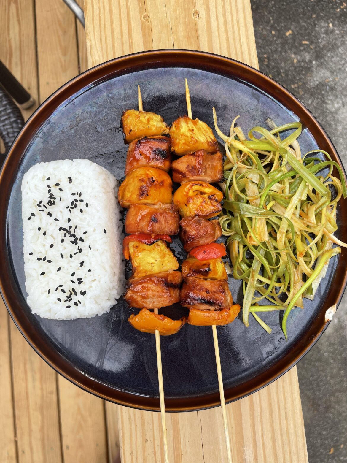 Gochujang pork kabobs and spicy scallion salad