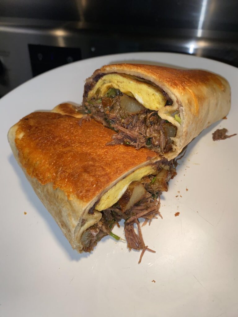 [Homemade] Cheese-Crusted Barbacoa Breakfast Burrito