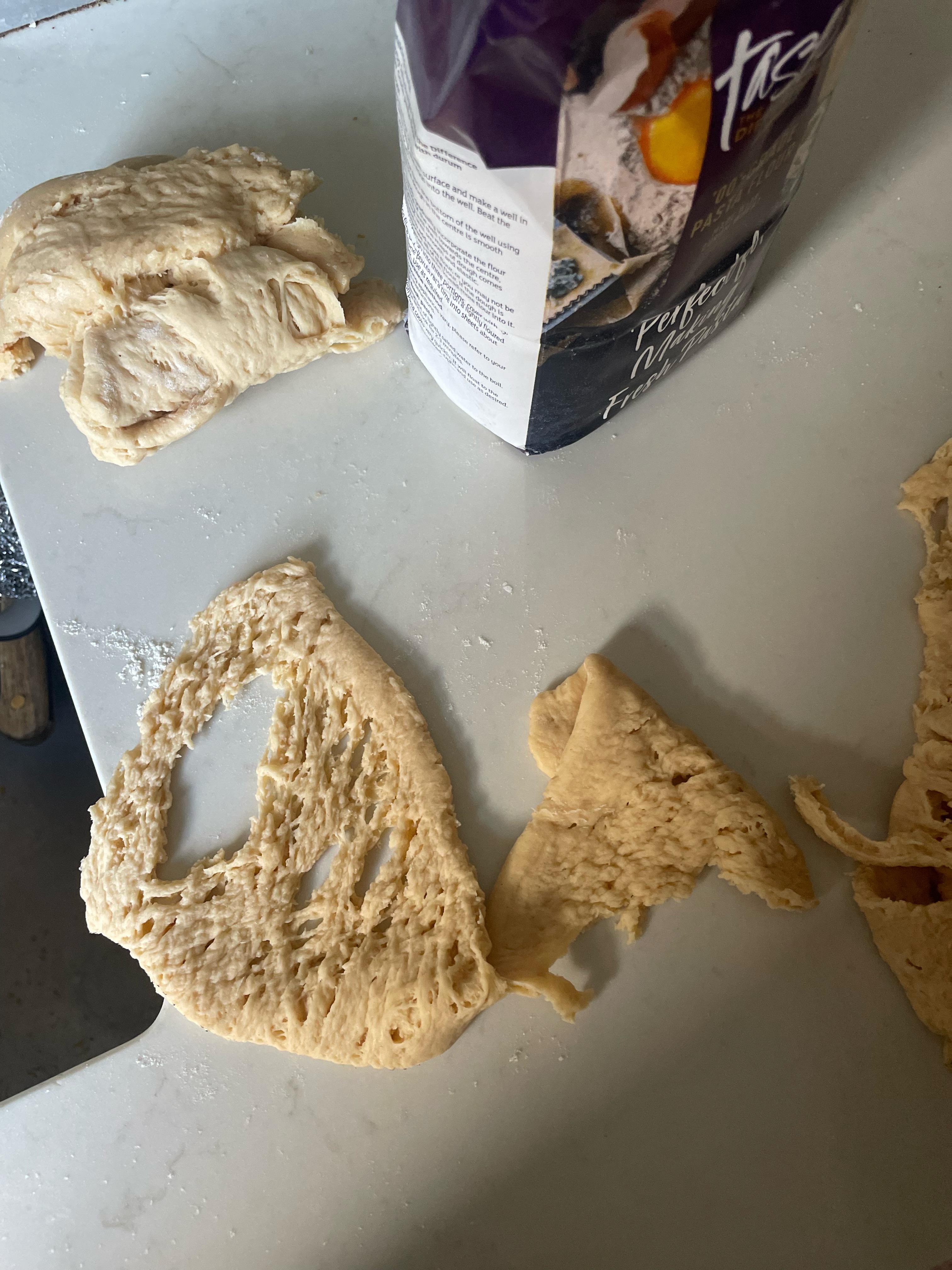 Help! Why is my pasta breaking when I roll it through the machine? (1