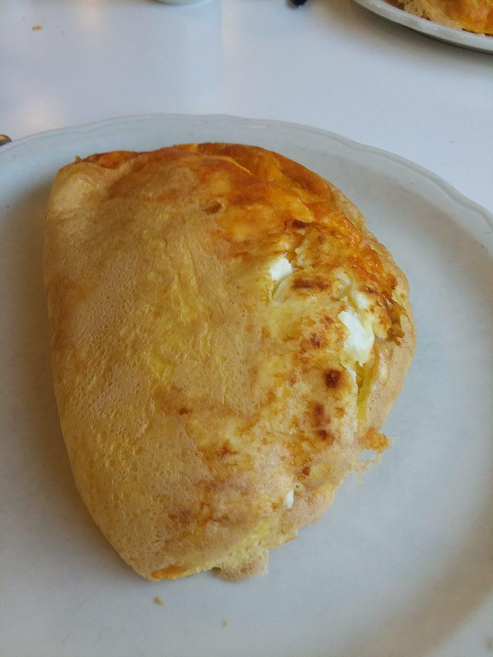 Cheddar cheese omelette with a little bit of pancake batter for extra