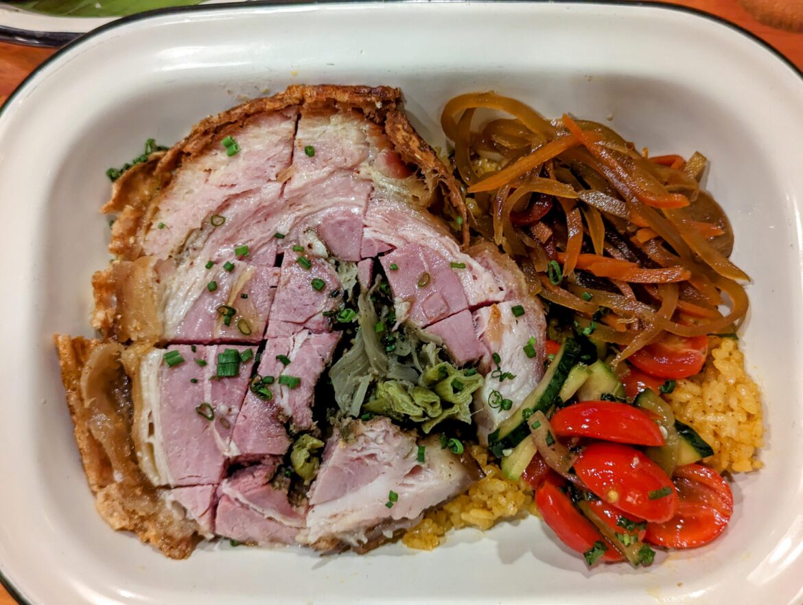 Lucenachon, Filipino roast pork, and garlic annatto rice at Kuya Lord